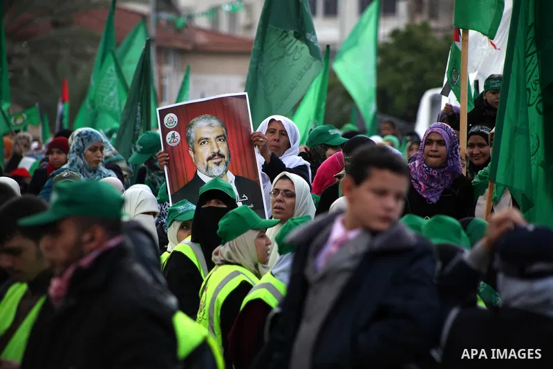 Palestinian Hamas supporters gather to attend a Hamas rally marking the 25th anniversary of the Islamist movement's founding in Gaza City on December 8, 2012. Hamas chief Khaled Meshaal arrived to Gaza strip on December...