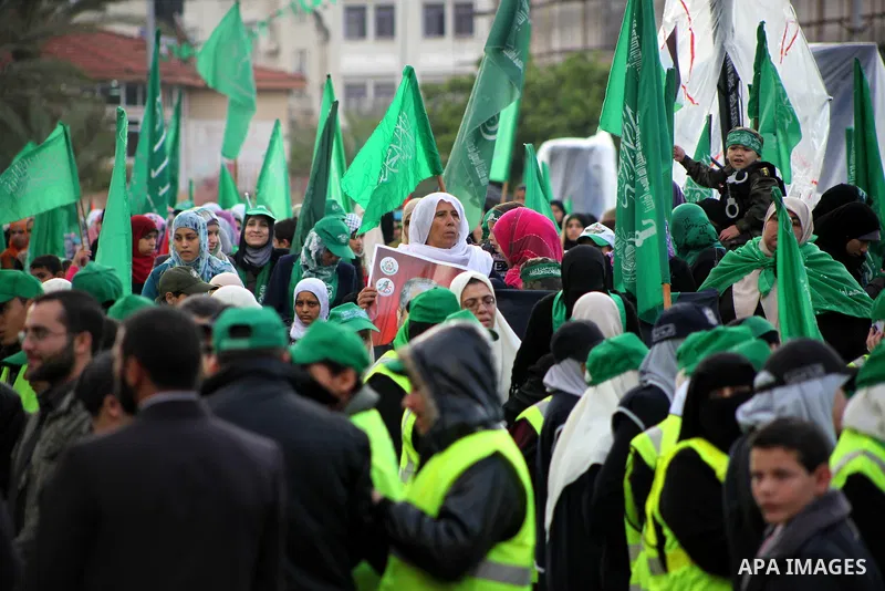 Palestinian Hamas supporters gather to attend a Hamas rally marking the 25th anniversary of the Islamist movement's founding in Gaza City on December 8, 2012. Hamas chief Khaled Meshaal arrived to Gaza strip on December...