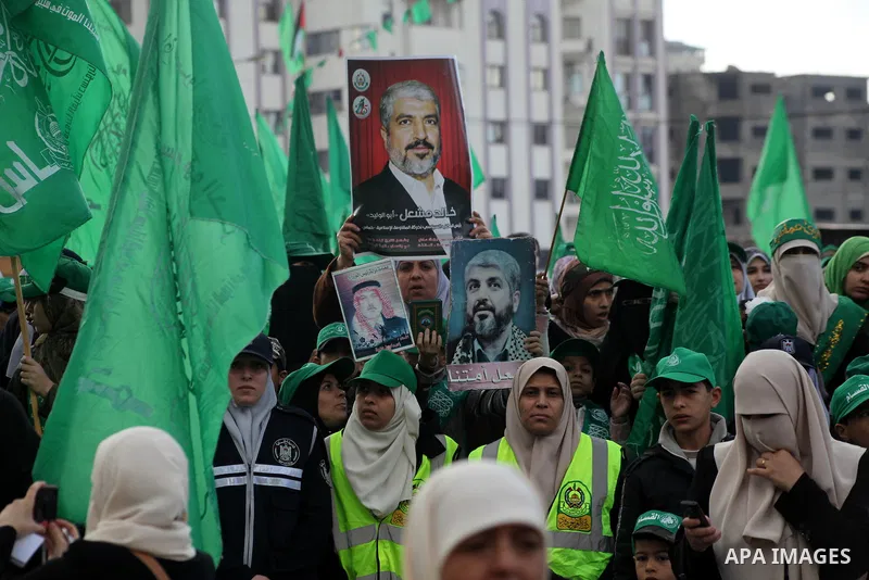 Palestinian Hamas supporters gather to attend a Hamas rally marking the 25th anniversary of the Islamist movement's founding in Gaza City on December 8, 2012. Hamas chief Khaled Meshaal arrived to Gaza strip on December...