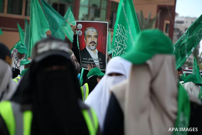 Palestinian Hamas supporters gather to attend a Hamas rally marking the 25th anniversary of the Islamist movement's founding in Gaza City on December 8, 2012. Hamas chief Khaled Meshaal arrived to Gaza strip on December...