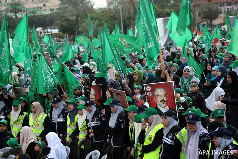 Palestinian Hamas supporters gather to attend a Hamas rally marking the 25th anniversary of the Islamist movement's founding in Gaza City on December 8, 2012. Hamas chief Khaled Meshaal arrived to Gaza strip on December...