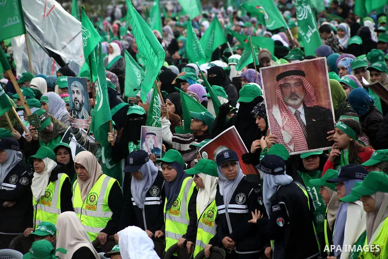 Palestinian Hamas supporters gather to attend a Hamas rally marking the 25th anniversary of the Islamist movement's founding in Gaza City on December 8, 2012. Hamas chief Khaled Meshaal arrived to Gaza strip on December...