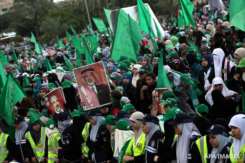Palestinian Hamas supporters gather to attend a Hamas rally marking the 25th anniversary of the Islamist movement's founding in Gaza City on December 8, 2012. Hamas chief Khaled Meshaal arrived to Gaza strip on December...