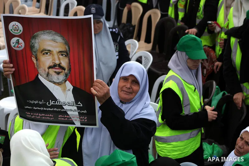Palestinian Hamas supporters gather to attend a Hamas rally marking the 25th anniversary of the Islamist movement's founding in Gaza City on December 8, 2012. Hamas chief Khaled Meshaal arrived to Gaza strip on December...