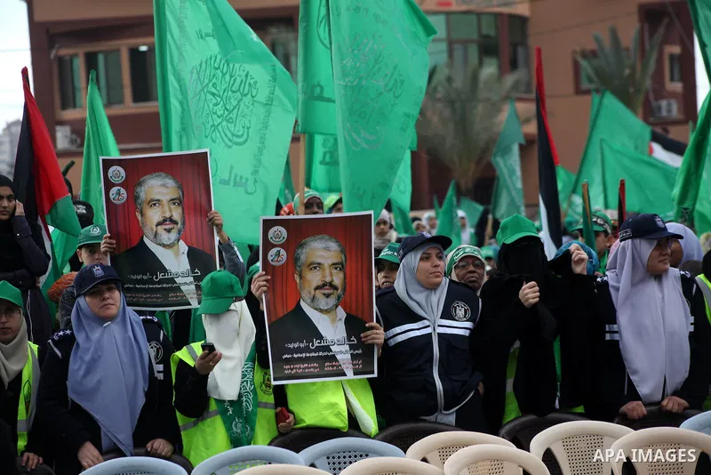 Palestinian Hamas supporters gather to attend a Hamas rally marking the 25th anniversary of the Islamist movement's founding in Gaza City on December 8, 2012. Hamas chief Khaled Meshaal arrived to Gaza strip on December...