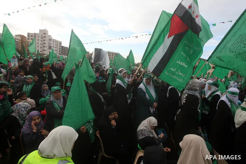 Palestinian Hamas supporters gather to attend a Hamas rally marking the 25th anniversary of the Islamist movement's founding in Gaza City on December 8, 2012. Hamas chief Khaled Meshaal arrived to Gaza strip on December...