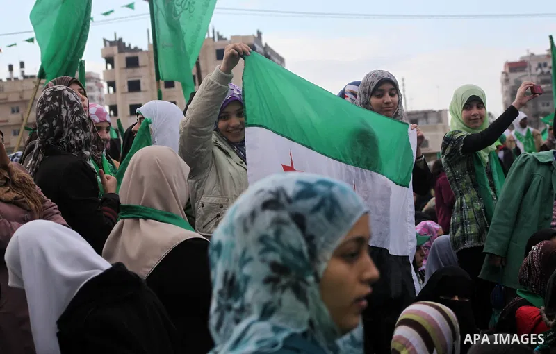 Palestinian Hamas supporters gather to attend a Hamas rally marking the 25th anniversary of the Islamist movement's founding in Gaza City on December 8, 2012. Hamas chief Khaled Meshaal arrived to Gaza strip on December...