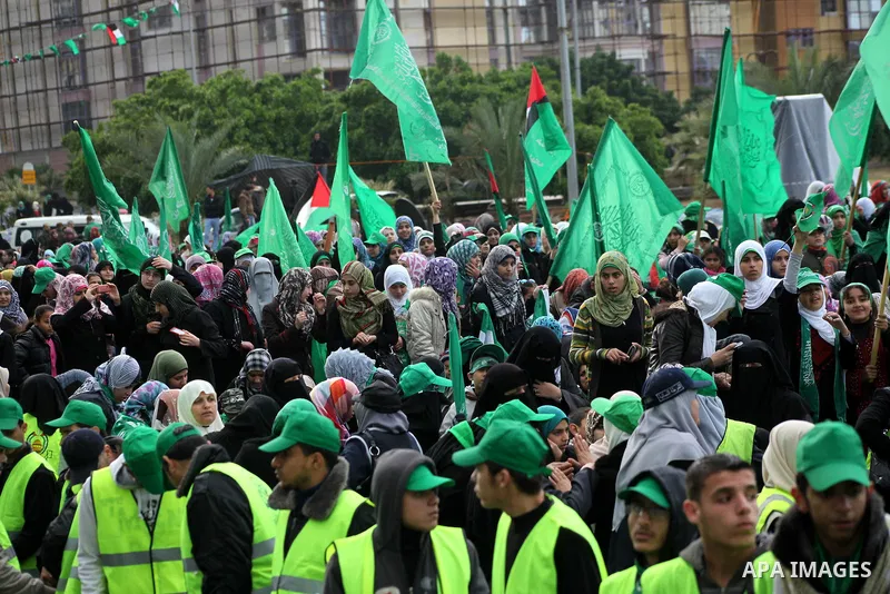 Palestinian Hamas supporters gather to attend a Hamas rally marking the 25th anniversary of the Islamist movement's founding in Gaza City on December 8, 2012. Hamas chief Khaled Meshaal arrived to Gaza strip on December...