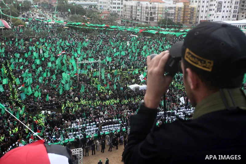 Palestinian Hamas supporters gather to attend a Hamas rally marking the 25th anniversary of the Islamist movement's founding in Gaza City on December 8, 2012. Hamas chief Khaled Meshaal arrived to Gaza strip on December...