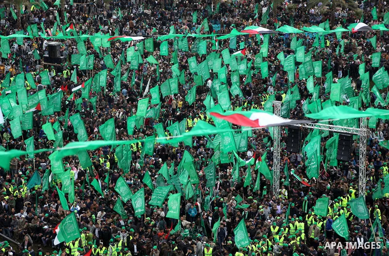 Palestinian Hamas supporters gather to attend a Hamas rally marking the 25th anniversary of the Islamist movement's founding in Gaza City on December 8, 2012. Hamas chief Khaled Meshaal arrived to Gaza strip on December...
