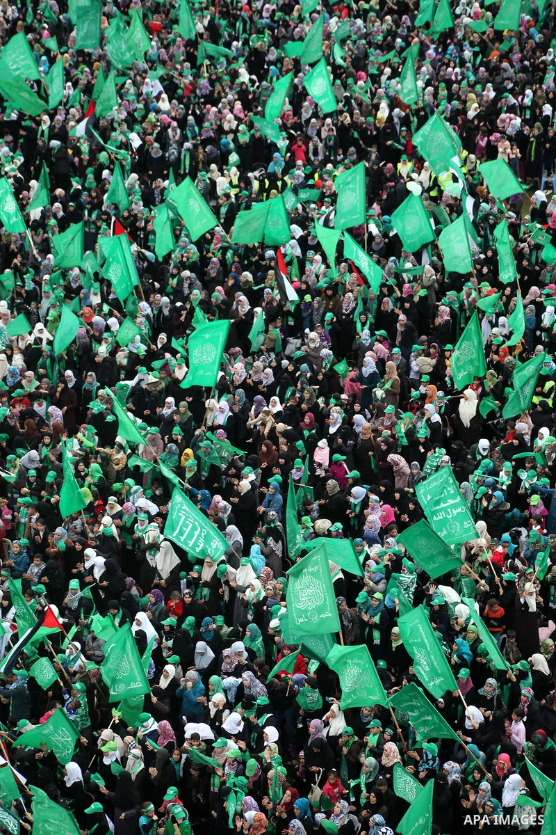 Palestinian Hamas supporters gather to attend a Hamas rally marking the 25th anniversary of the Islamist movement's founding in Gaza City on December 8, 2012. Hamas chief Khaled Meshaal arrived to Gaza strip on December...