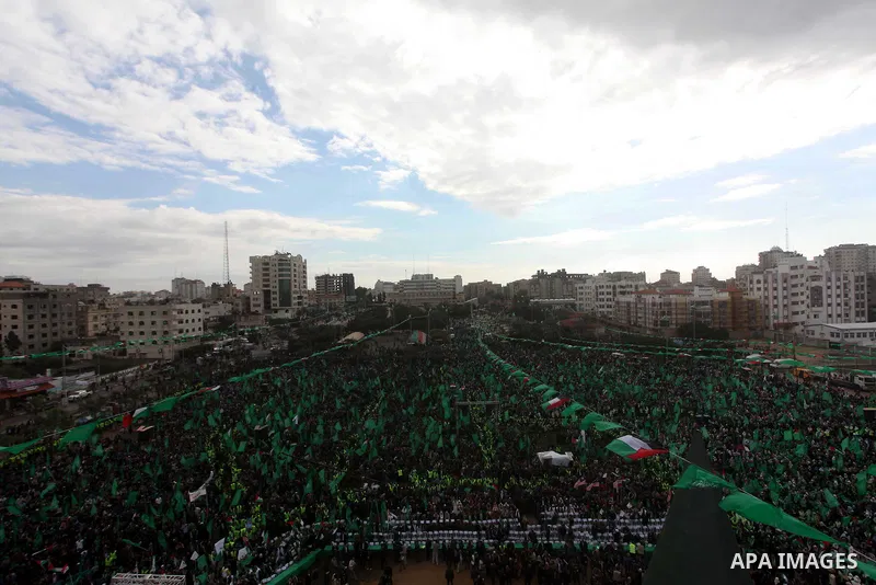 Palestinian Hamas supporters gather to attend a Hamas rally marking the 25th anniversary of the Islamist movement's founding in Gaza City on December 8, 2012. Hamas chief Khaled Meshaal arrived to Gaza strip on December...