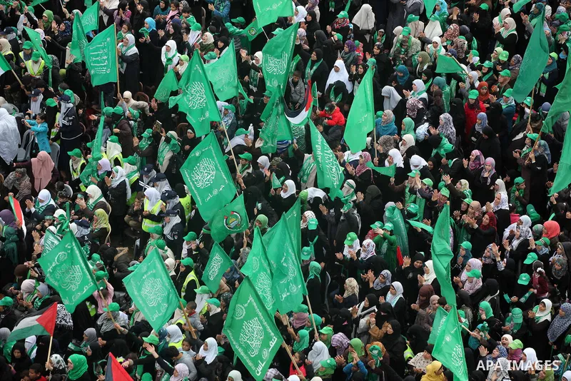 Palestinian Hamas supporters gather to attend a Hamas rally marking the 25th anniversary of the Islamist movement's founding in Gaza City on December 8, 2012. Hamas chief Khaled Meshaal arrived to Gaza strip on December...