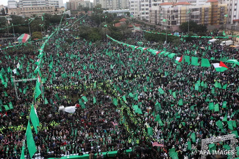 Palestinian Hamas supporters gather to attend a Hamas rally marking the 25th anniversary of the Islamist movement's founding in Gaza City on December 8, 2012. Hamas chief Khaled Meshaal arrived to Gaza strip on December...