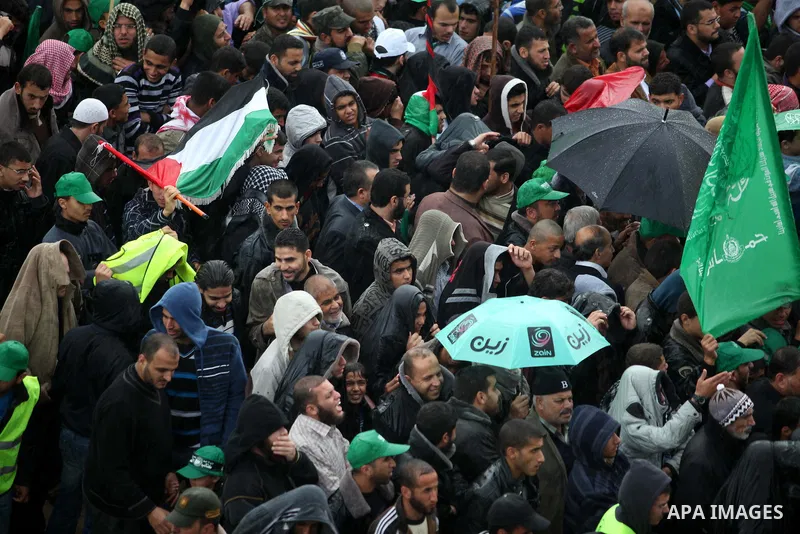 Palestinian Hamas supporters attend a Hamas rally marking the 25th anniversary of the Islamist movement's founding in Gaza City on December 8, 2012. Hamas chief Khaled Meshaal arrived to Gaza strip on December 7 during h...