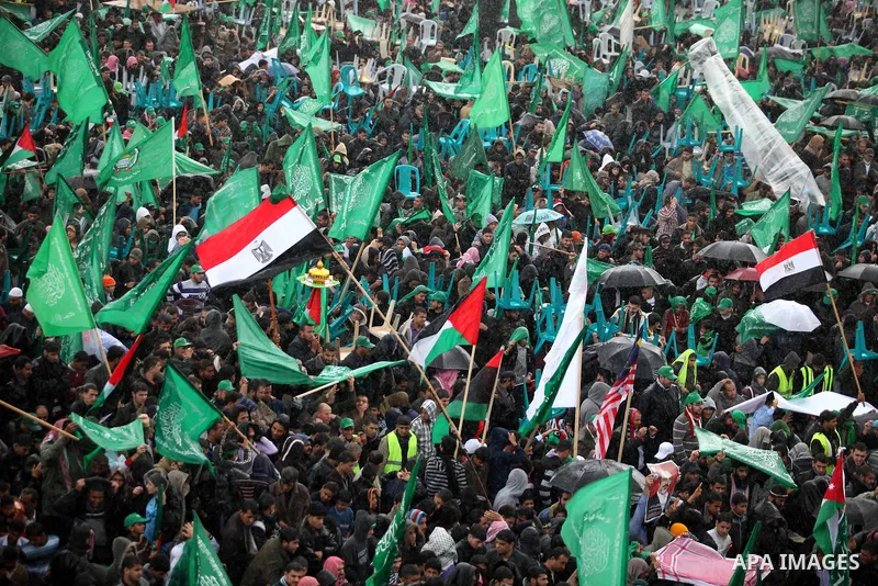 Palestinian Hamas supporters attend a Hamas rally marking the 25th anniversary of the Islamist movement's founding in Gaza City on December 8, 2012. Hamas chief Khaled Meshaal arrived to Gaza strip on December 7 during h...