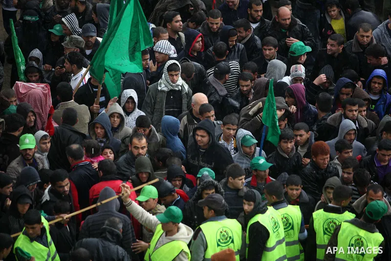 Palestinian Hamas supporters attend a Hamas rally marking the 25th anniversary of the Islamist movement's founding in Gaza City on December 8, 2012. Hamas chief Khaled Meshaal arrived to Gaza strip on December 7 during h...