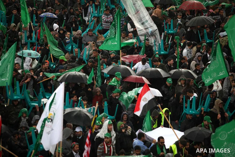 Palestinian Hamas supporters attend a Hamas rally marking the 25th anniversary of the Islamist movement's founding in Gaza City on December 8, 2012. Hamas chief Khaled Meshaal arrived to Gaza strip on December 7 during h...