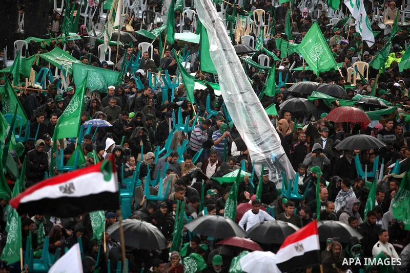 Palestinian Hamas supporters attend a Hamas rally marking the 25th anniversary of the Islamist movement's founding in Gaza City on December 8, 2012. Hamas chief Khaled Meshaal arrived to Gaza strip on December 7 during h...