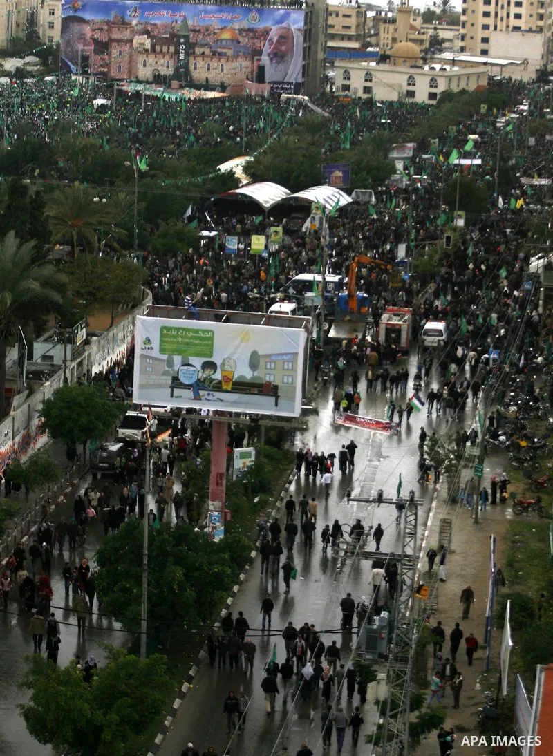 Palestinian Hamas supporters attend a Hamas rally marking the 25th anniversary of the Islamist movement's founding in Gaza City on December 8, 2012. Hamas chief Khaled Meshaal arrived to Gaza strip on December 7 during h...