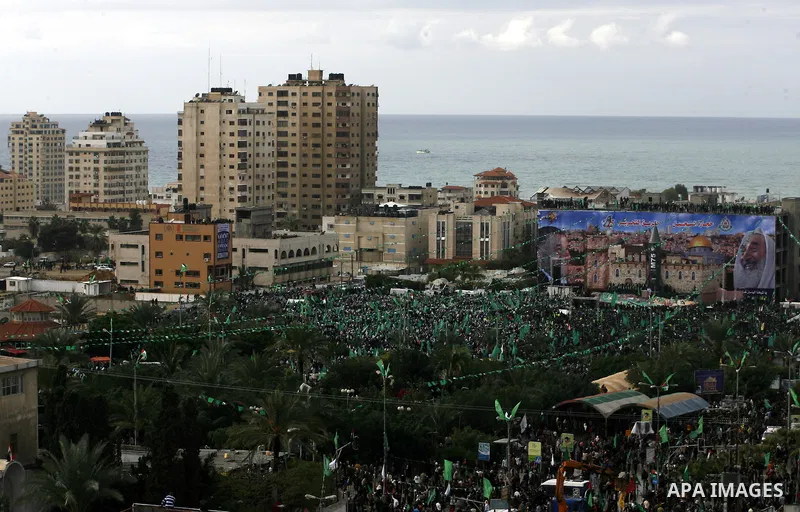 Palestinian Hamas supporters attend a Hamas rally marking the 25th anniversary of the Islamist movement's founding in Gaza City on December 8, 2012. Hamas chief Khaled Meshaal arrived to Gaza strip on December 7 during h...