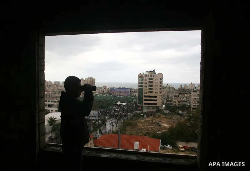 Palestinian Hamas supporters attend a Hamas rally marking the 25th anniversary of the Islamist movement's founding in Gaza City on December 8, 2012. Hamas chief Khaled Meshaal arrived to Gaza strip on December 7 during h...