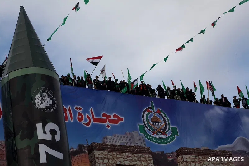 Palestinian Hamas supporters gather to attend a Hamas rally marking the 25th anniversary of the Islamist movement's founding in Gaza City on December 8, 2012. Hamas chief Khaled Meshaal arrived to Gaza strip on December...