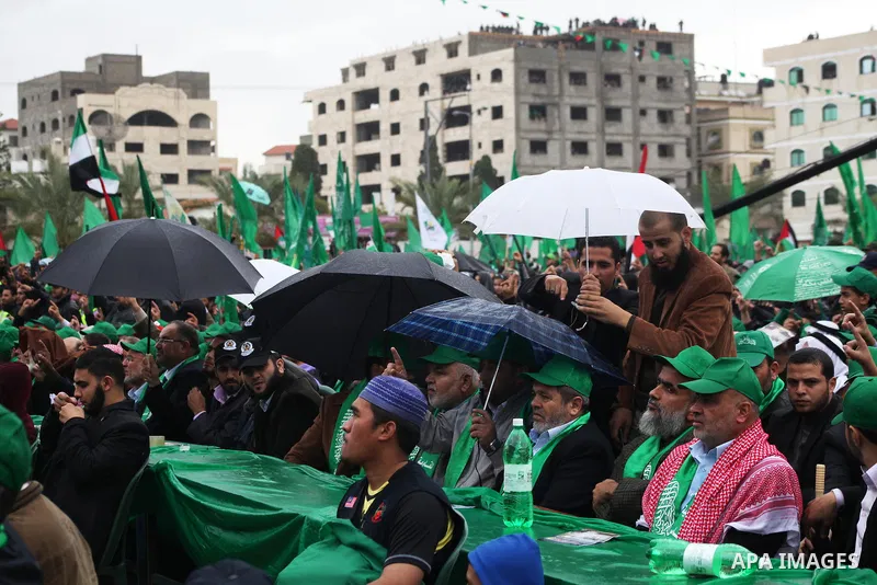 Palestinian Hamas supporters attend a Hamas rally marking the 25th anniversary of the Islamist movement's founding in Gaza City on December 8, 2012. Hamas chief Khaled Meshaal arrived to Gaza strip on December 7 during h...