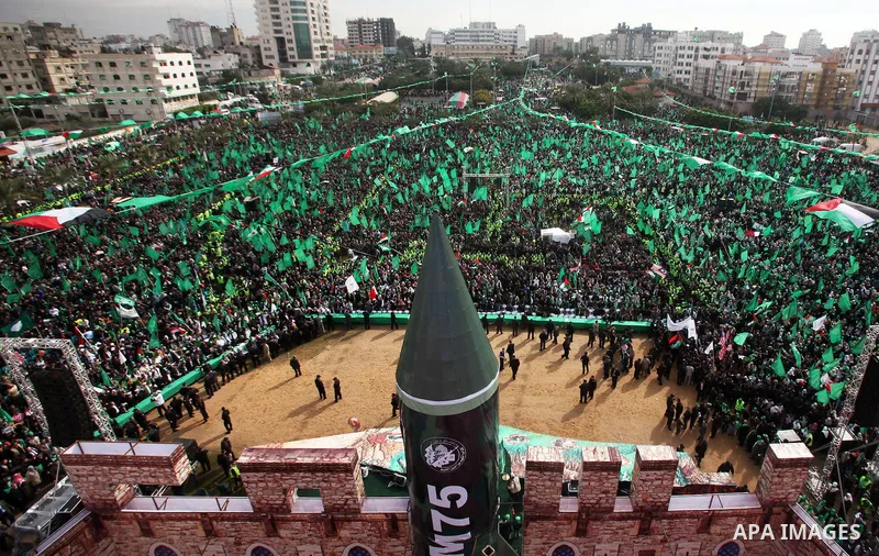 Palestinian Hamas supporters attend a Hamas rally marking the 25th anniversary of the Islamist movement's founding in Gaza City on December 8, 2012. Hamas chief Khaled Meshaal arrived to Gaza strip on December 7 during h...