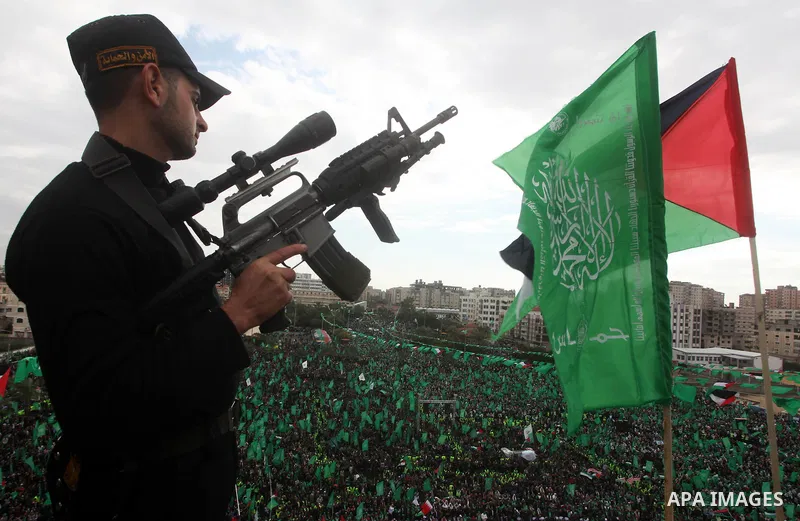 Palestinian Hamas supporters attend a Hamas rally marking the 25th anniversary of the Islamist movement's founding in Gaza City on December 8, 2012. Hamas chief Khaled Meshaal arrived to Gaza strip on December 7 during h...