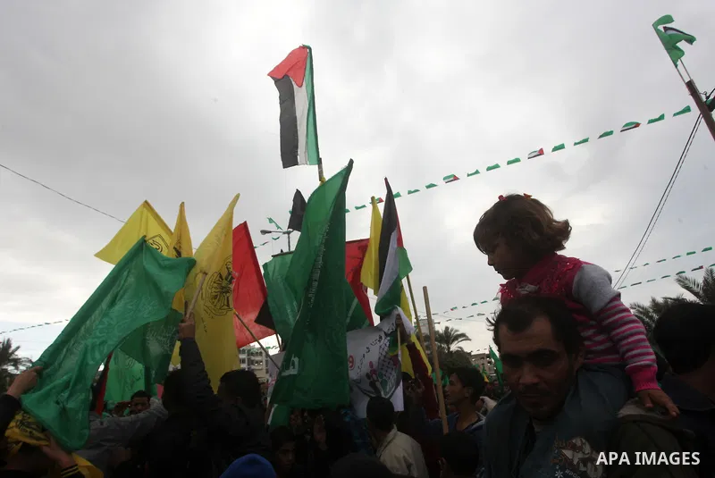 Palestinian Hamas supporters attend a Hamas rally marking the 25th anniversary of the Islamist movement's founding in Gaza City on December 8, 2012. Hamas chief Khaled Meshaal arrived to Gaza strip on December 7 during h...