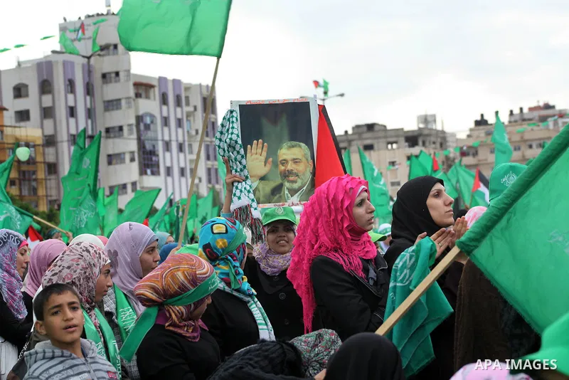 Palestinian Hamas supporters attend a Hamas rally marking the 25th anniversary of the Islamist movement's founding in Gaza City on December 8, 2012. Hamas chief Khaled Meshaal arrived to Gaza strip on December 7 during h...