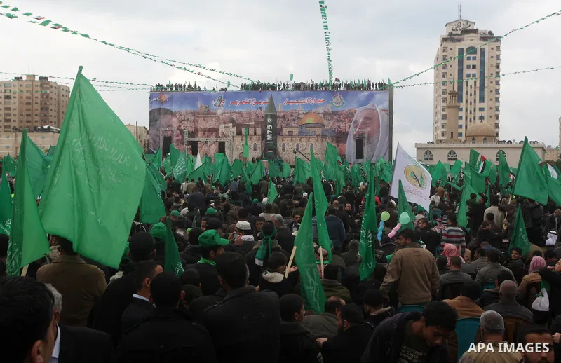Palestinian Hamas supporters attend a Hamas rally marking the 25th anniversary of the Islamist movement's founding in Gaza City on December 8, 2012. Hamas chief Khaled Meshaal arrived to Gaza strip on December 7 during h...