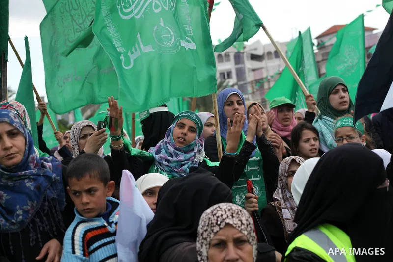 Palestinian Hamas supporters attend a Hamas rally marking the 25th anniversary of the Islamist movement's founding in Gaza City on December 8, 2012. Hamas chief Khaled Meshaal arrived to Gaza strip on December 7 during h...