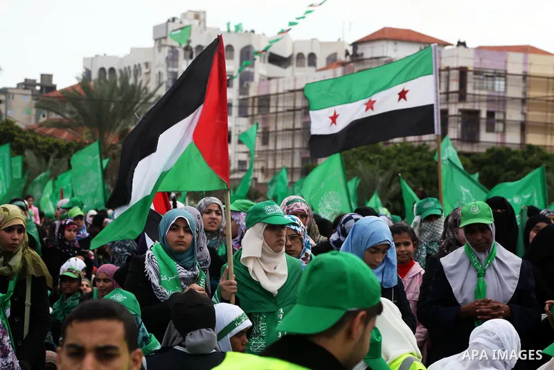 Palestinian Hamas supporters attend a Hamas rally marking the 25th anniversary of the Islamist movement's founding in Gaza City on December 8, 2012. Hamas chief Khaled Meshaal arrived to Gaza strip on December 7 during h...