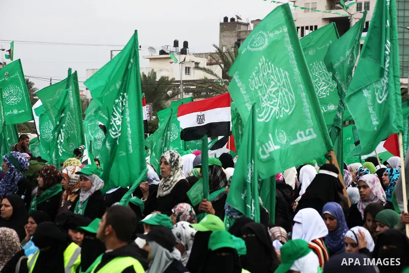 Palestinian Hamas supporters attend a Hamas rally marking the 25th anniversary of the Islamist movement's founding in Gaza City on December 8, 2012. Hamas chief Khaled Meshaal arrived to Gaza strip on December 7 during h...