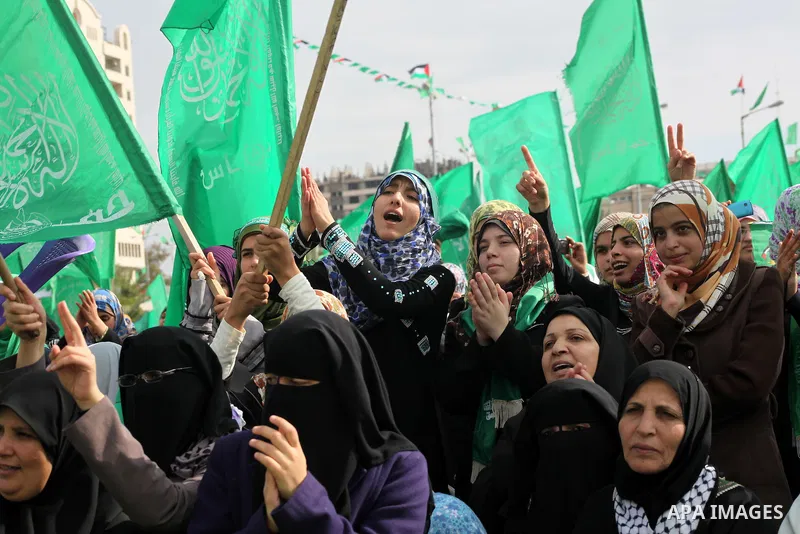 Palestinian Hamas supporters attend a Hamas rally marking the 25th anniversary of the Islamist movement's founding in Gaza City on December 8, 2012. Hamas chief Khaled Meshaal arrived to Gaza strip on December 7 during h...