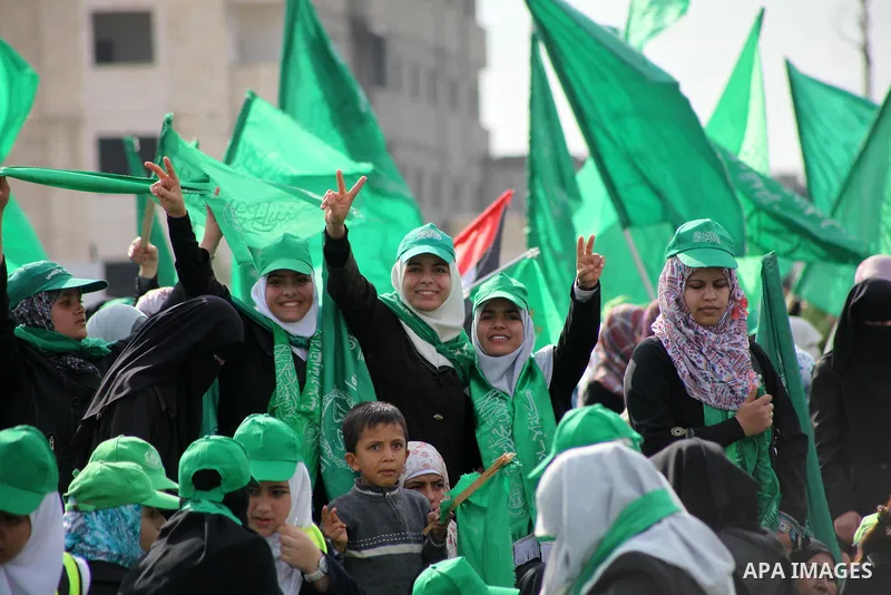 Palestinian Hamas supporters attend a Hamas rally marking the 25th anniversary of the Islamist movement's founding in Gaza City on December 8, 2012. Hamas chief Khaled Meshaal arrived to Gaza strip on December 7 during h...