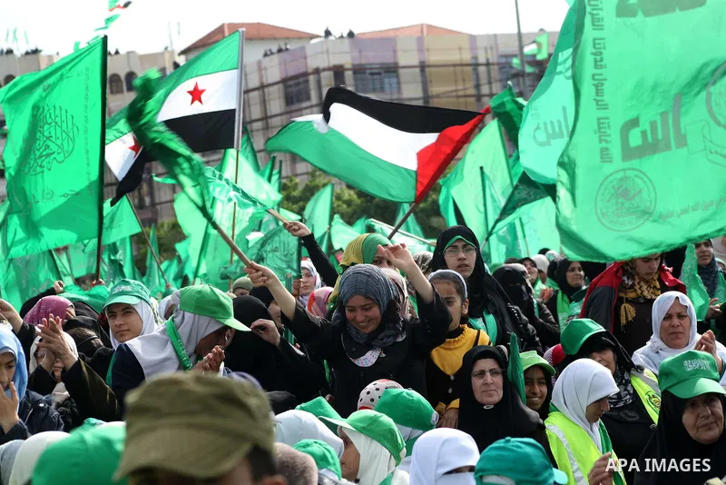 Palestinian Hamas supporters attend a Hamas rally marking the 25th anniversary of the Islamist movement's founding in Gaza City on December 8, 2012. Hamas chief Khaled Meshaal arrived to Gaza strip on December 7 during h...