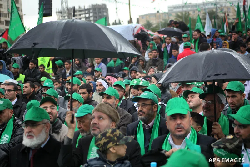 Palestinian Hamas supporters attend a Hamas rally marking the 25th anniversary of the Islamist movement's founding in Gaza City on December 8, 2012. Hamas chief Khaled Meshaal arrived to Gaza strip on December 7 during h...