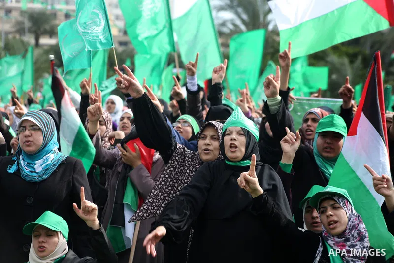 Palestinian Hamas supporters attend a Hamas rally marking the 25th anniversary of the Islamist movement's founding in Gaza City on December 8, 2012. Hamas chief Khaled Meshaal arrived to Gaza strip on December 7 during h...