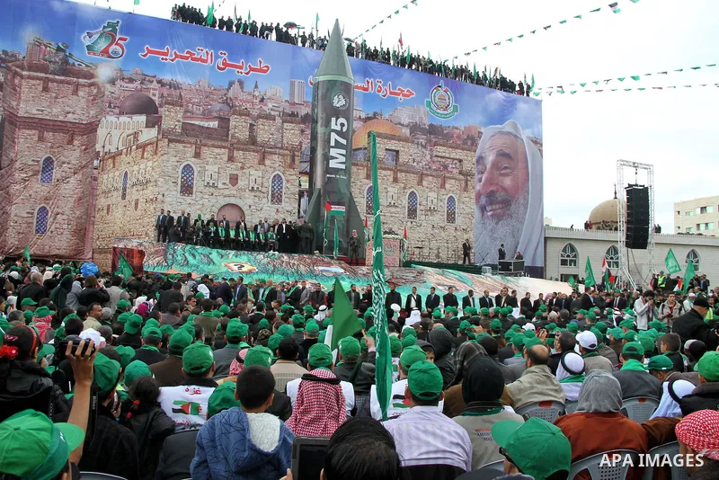 Palestinian Hamas supporters attend a Hamas rally marking the 25th anniversary of the Islamist movement's founding in Gaza City on December 8, 2012. Hamas chief Khaled Meshaal arrived to Gaza strip on December 7 during h...