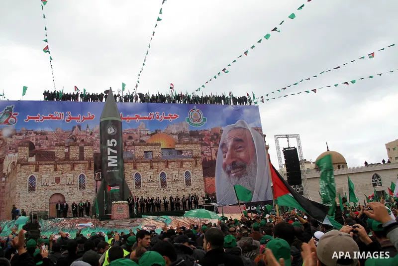 Palestinian Hamas supporters attend a Hamas rally marking the 25th anniversary of the Islamist movement's founding in Gaza City on December 8, 2012. Hamas chief Khaled Meshaal arrived to Gaza strip on December 7 during h...
