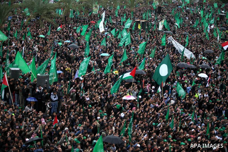 Palestinian Hamas supporters attend a Hamas rally marking the 25th anniversary of the Islamist movement's founding in Gaza City on December 8, 2012. Hamas chief Khaled Meshaal arrived to Gaza strip on December 7 during h...