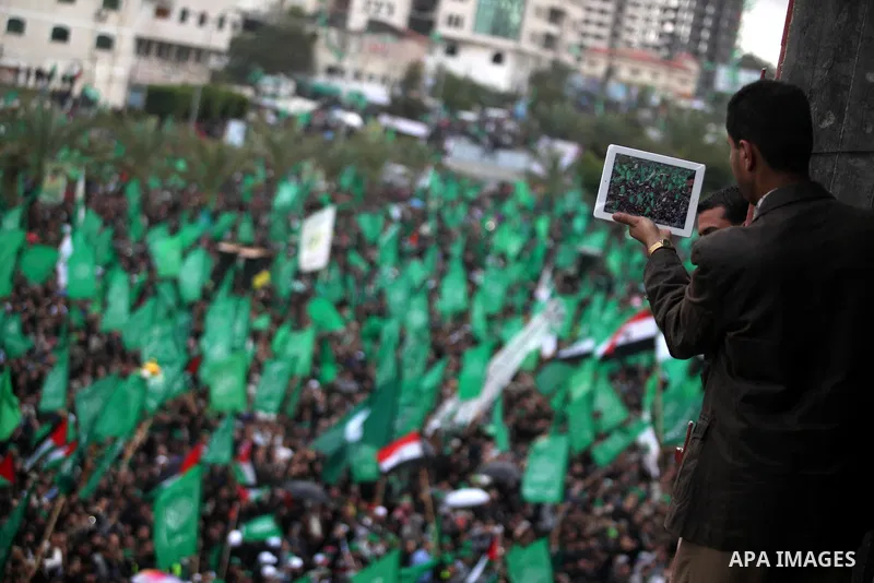 Palestinian Hamas supporters attend a Hamas rally marking the 25th anniversary of the Islamist movement's founding in Gaza City on December 8, 2012. Hamas chief Khaled Meshaal arrived to Gaza strip on December 7 during h...