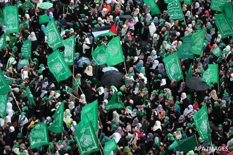 Palestinian Hamas supporters attend a Hamas rally marking the 25th anniversary of the Islamist movement's founding in Gaza City on December 8, 2012. Hamas chief Khaled Meshaal arrived to Gaza strip on December 7 during h...