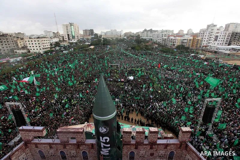 Palestinian Hamas supporters attend a Hamas rally marking the 25th anniversary of the Islamist movement's founding in Gaza City on December 8, 2012. Hamas chief Khaled Meshaal arrived to Gaza strip on December 7 during h...