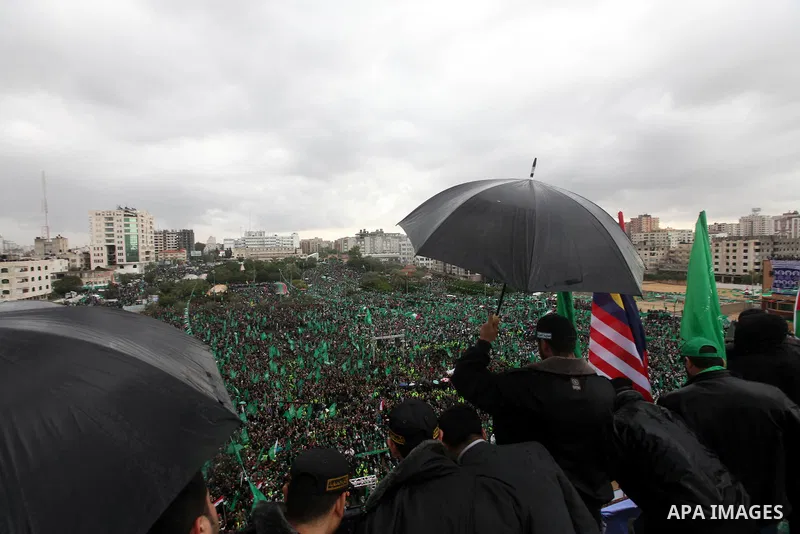 Palestinian Hamas supporters attend a Hamas rally marking the 25th anniversary of the Islamist movement's founding in Gaza City on December 8, 2012. Hamas chief Khaled Meshaal arrived to Gaza strip on December 7 during h...