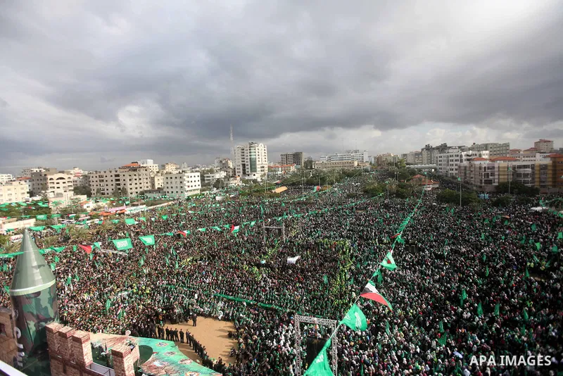 Palestinian Hamas supporters attend a Hamas rally marking the 25th anniversary of the Islamist movement's founding in Gaza City on December 8, 2012. Hamas chief Khaled Meshaal arrived to Gaza strip on December 7 during h...