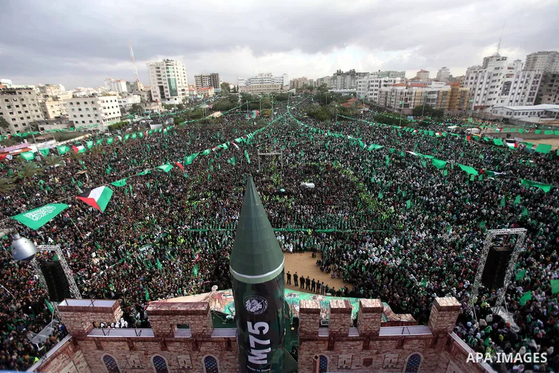 Palestinian Hamas supporters attend a Hamas rally marking the 25th anniversary of the Islamist movement's founding in Gaza City on December 8, 2012. Hamas chief Khaled Meshaal arrived to Gaza strip on December 7 during h...